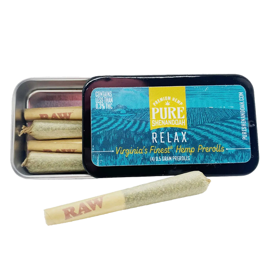 Pure Shenandoah Relax Pre-Rolls tin, blue and yellow packaging labeled "Virginia’s Finest Hemp Prerolls," open tin with 0.5 g hemp pre-rolls and one displayed in front.
